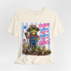 Frog Gardener Graphic Tee — "J'enterrer des choses... peut-être des plantes, peut-être des gens"